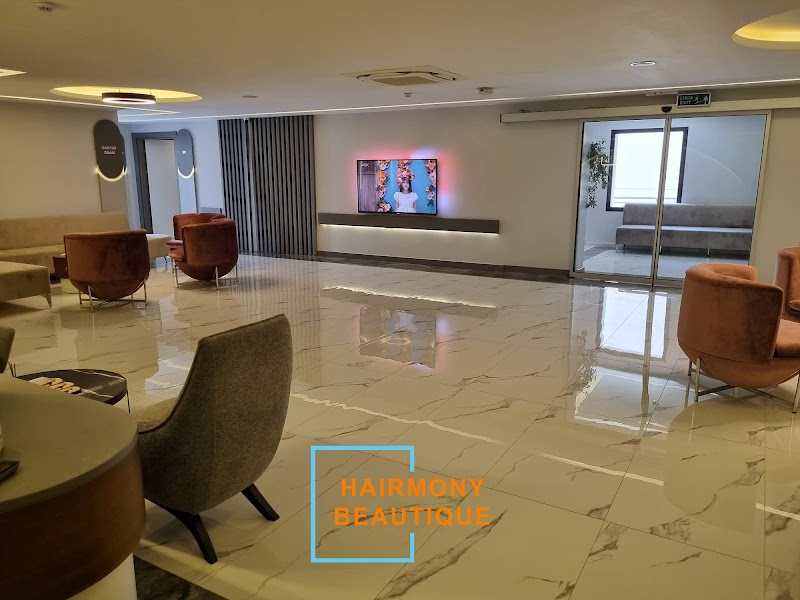 Hairmony Beautique logo