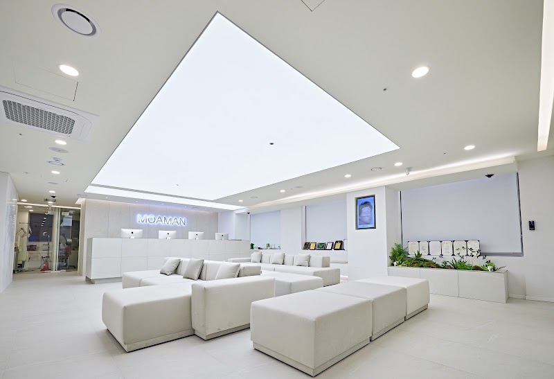 MOAMAN Hair Transplant Clinic logo