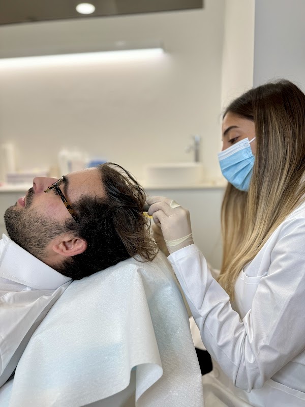 Remind Hair | Tricólogo Barcelona logo